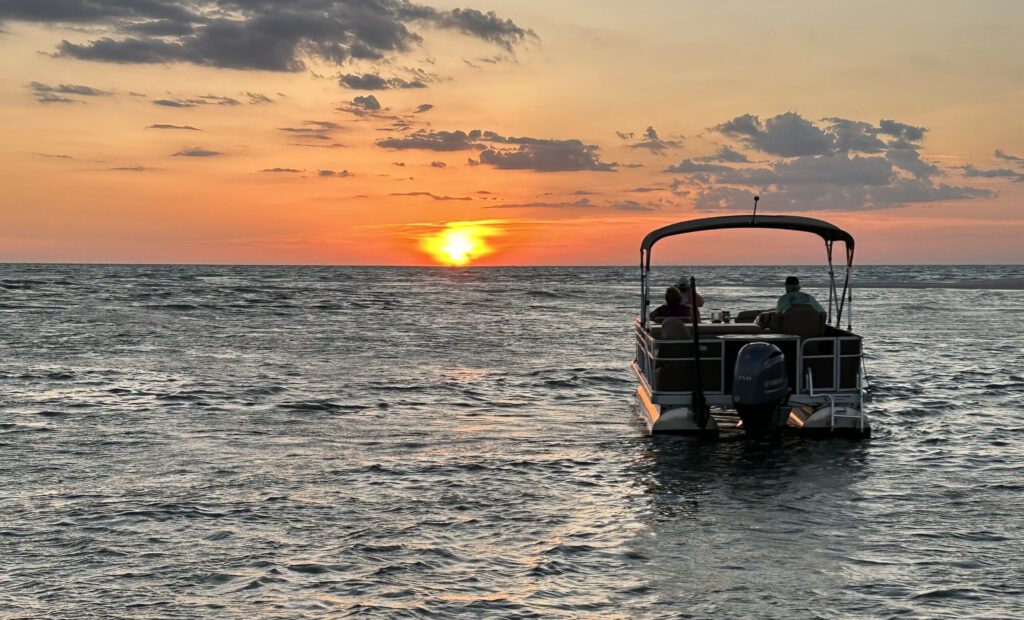 a sunset over a body of water