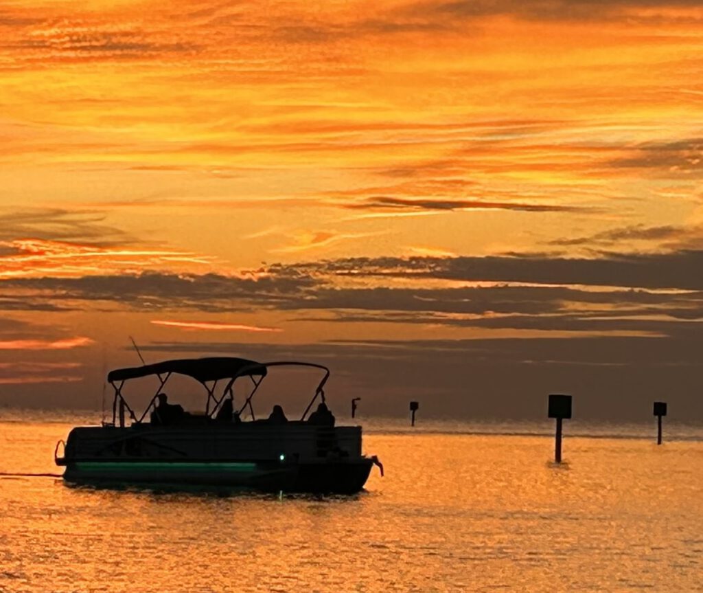 a sunset over a body of water