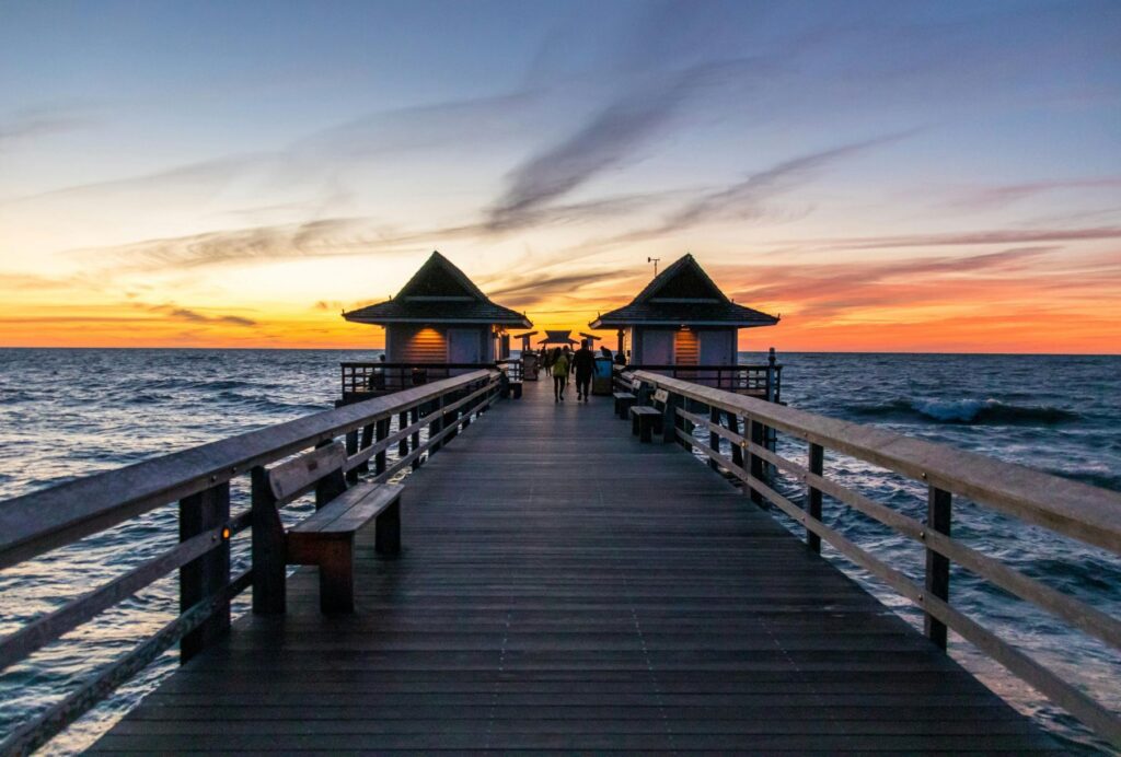pier at sunset in Naples, FL