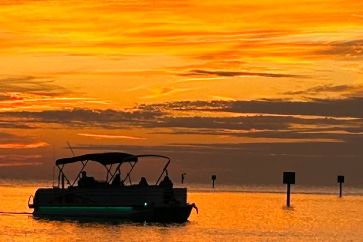 a sunset over a body of water